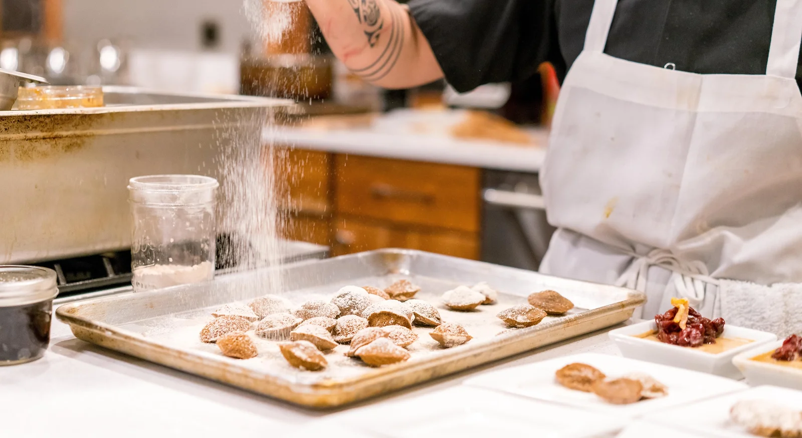 person%20baking%20infront%20of%20table_edited.jpg